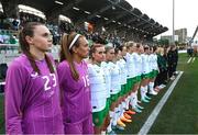 22 June 2023; Republic of Ireland players, including Megan Walsh, Grace Moloney and Chloe Mustaki stand for the playing of the National Anthem before the women's international friendly match between Republic of Ireland and Zambia at Tallaght Stadium in Dublin. Photo by Stephen McCarthy/Sportsfile
