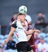 23 June 2023; Greg Sloggett of Dundalk in action against Freddie Draper of Drogheda United during the SSE Airtricity Men's Premier Division match between Drogheda United and Dundalk at Weaver's Park in Drogheda, Louth. Photo by Piaras Ó Mídheach/Sportsfile