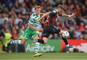 23 June 2023; Adam McDonnell of Bohemians in action against Daniel Cleary of Shamrock Rovers during the SSE Airtricity Men's Premier Division match between Bohemians and Shamrock Rovers at Dalymount Park in Dublin. Photo by Seb Daly/Sportsfile