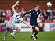 23 June 2023; Conor Carty of St Patrick's Athletic in action against Gavin Molloy of Shelbourne during the SSE Airtricity Men's Premier Division match between St Patrick's Athletic and Shelbourne at Richmond Park in Dublin. Photo by Harry Murphy/Sportsfile