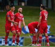 23 June 2023; Sligo Rovers captain David Cawley celebrates after scoring his side's first goal with Max Mata, left, and Stefan Radosavljevic during the SSE Airtricity Men's Premier Division match between UCD and Sligo Rovers at UCD Bowl in Dublin. Photo by Stephen Marken/Sportsfile