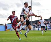 23 June 2023; Dundalk players Archie Davies and Patrick Hoban, right, in action against Dayle Rooney of Drogheda United during the SSE Airtricity Men's Premier Division match between Drogheda United and Dundalk at Weaver's Park in Drogheda, Louth. Photo by Piaras Ó Mídheach/Sportsfile