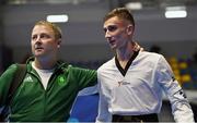 23 June 2023; Jack Woolley of Ireland, right, with coach Robert Taaffe, reacts after being defeated by Adrian Vicente Yunta of Spain in their Taekwando Men's 58kg gold medal final match at the Krynica-Zdrój Arena during the European Games 2023 in Poland. Photo by David Fitzgerald/Sportsfile