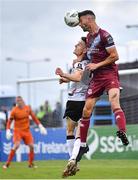 23 June 2023; Adam Foley of Drogheda United wins a header above Darragh Leahy of Dundalk during the SSE Airtricity Men's Premier Division match between Drogheda United and Dundalk at Weaver's Park in Drogheda, Louth. Photo by Piaras Ó Mídheach/Sportsfile