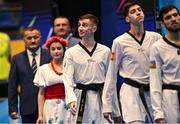 23 June 2023; Jack Woolley of Ireland, centre, makes his way to receive his silver medal after his Taekwando Men's 58kg gold medal final match against Adrian Vicente Yunta of Spain at the Krynica-Zdrój Arena during the European Games 2023 in Poland. Photo by David Fitzgerald/Sportsfile
