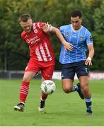 23 June 2023; David Cawley of Sligo Rovers in action against Evan Osam of UCD during the SSE Airtricity Men's Premier Division match between UCD and Sligo Rovers at UCD Bowl in Dublin. Photo by Stephen Marken/Sportsfile