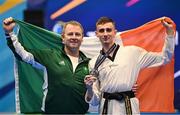 23 June 2023; Jack Woolley of Ireland with his silver medal and coach Robert Taaffe at the Krynica-Zdrój Arena during the European Games 2023 in Poland. Photo by David Fitzgerald/Sportsfile