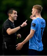 23 June 2023; Referee Adriano Reale speaks to Alex Nolan of UCD during the SSE Airtricity Men's Premier Division match between UCD and Sligo Rovers at UCD Bowl in Dublin. Photo by Stephen Marken/Sportsfile