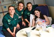 26 June 2023; Republic of Ireland players, from left, Chloe Mustaki, Ciara Grant and Harriet Scott, with Annie Pedersen, age 12, from Beaumont, Dublin, during a visit to Temple Street Children's Hospital in Dublin. Photo by Ramsey Cardy/Sportsfile