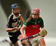 24 June 2023; Rory Glynn of James Stephens in action against Fionn Plunkett of Clarecastle during the John West Féile na nGael Division 1 Group 2 match at Connacht GAA Centre of Excellence in Bekan, Mayo. Photo by Stephen Marken/Sportsfile