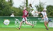 24 June 2023; Ciaran Weadick of Raheny, Dublin,  in action against Donagh Keogh of St Mary's Athenry, Galway, during the John West Féile na nGael National Camogie and Hurling Finals 2023 at the Connacht GAA Centre in Bekan, Mayo. Eighty club sides took part in the national finals across seven venues in Connacht. Sponsored for the eighth time by John West, it is one of the biggest underage sporting events on the continent. Photo by Sam Barnes/Sportsfile