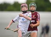 24 June 2023; Michael Barrett of St Mary's Athenry, Galway, in action against Robert Fox of Raheny, Dublin, during the John West Féile na nGael National Camogie and Hurling Finals 2023 at the Connacht GAA Centre in Bekan, Mayo. Eighty club sides took part in the national finals across seven venues in Connacht. Sponsored for the eighth time by John West, it is one of the biggest underage sporting events on the continent. Photo by Sam Barnes/Sportsfile