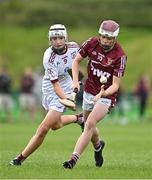 24 June 2023; Darragh O'Connor of Raheny, Dublin, in action against Donagh Keogh of St Mary's Athenry, Galway, during the John West Féile na nGael National Camogie and Hurling Finals 2023 at the Connacht GAA Centre in Bekan, Mayo. Eighty club sides took part in the national finals across seven venues in Connacht. Sponsored for the eighth time by John West, it is one of the biggest underage sporting events on the continent. Photo by Sam Barnes/Sportsfile