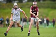 24 June 2023; Darragh O'Connor of Raheny, Dublin, in action against Donagh Keogh of St Mary's Athenry, Galway, during the John West Féile na nGael National Camogie and Hurling Finals 2023 at the Connacht GAA Centre in Bekan, Mayo. Eighty club sides took part in the national finals across seven venues in Connacht. Sponsored for the eighth time by John West, it is one of the biggest underage sporting events on the continent. Photo by Sam Barnes/Sportsfile