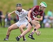 24 June 2023; Bryan Coakley of Raheny, Dublin, in action against Patrick Whelan of St Mary's Athenry, Galway, during the John West Féile na nGael National Camogie and Hurling Finals 2023 at the Connacht GAA Centre in Bekan, Mayo. Eighty club sides took part in the national finals across seven venues in Connacht. Sponsored for the eighth time by John West, it is one of the biggest underage sporting events on the continent. Photo by Sam Barnes/Sportsfile