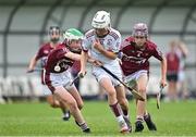 24 June 2023; Anthony Poniard of St Mary's Athenry, Galway, in action against Bryan Coakley, left, and Thomas Judge of Raheny, Dublin, during the John West Féile na nGael National Camogie and Hurling Finals 2023 at the Connacht GAA Centre in Bekan, Mayo. Eighty club sides took part in the national finals across seven venues in Connacht. Sponsored for the eighth time by John West, it is one of the biggest underage sporting events on the continent. Photo by Sam Barnes/Sportsfile