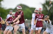 24 June 2023; Nathan Gibney of Raheny, Dublin, in action against Fionn Atkins of St Mary's Athenry, Galway, during the John West Féile na nGael National Camogie and Hurling Finals 2023 at the Connacht GAA Centre in Bekan, Mayo. Eighty club sides took part in the national finals across seven venues in Connacht. Sponsored for the eighth time by John West, it is one of the biggest underage sporting events on the continent. Photo by Sam Barnes/Sportsfile