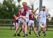 24 June 2023; Anthony Poniard of St Mary's Athenry, Galway, in action against Tadhg Shanahan, left, and Andrew Fox of Raheny, Dublin, during the John West Féile na nGael National Camogie and Hurling Finals 2023 at the Connacht GAA Centre in Bekan, Mayo. Eighty club sides took part in the national finals across seven venues in Connacht. Sponsored for the eighth time by John West, it is one of the biggest underage sporting events on the continent. Photo by Sam Barnes/Sportsfile
