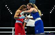 24 June 2023; Michaela Walsh of Ireland, right, embraces Olga Pavlina Papadatou of Greece after her victory in their Lightweight 57kg bout at the Nowy Targ Arena during the European Games 2023 in Poland. Photo by Tyler Miller/Sportsfile