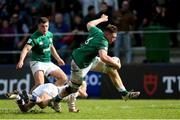 24 June 2023; Diarmuid Mangan of Ireland gets past Sam Harris of England attempted tackle during the U20 Rugby World Cup match between England and Ireland at Paarl Gymnasium in Paarl, South Africa. Photo by Shaun Roy/Sportsfile