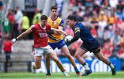 24 June 2023; Conor Carroll of Roscommon in action against Rory Maguire of Cork during the GAA Football All-Ireland Senior Championship Preliminary Quarter Final match between Cork and Roscommon at Páirc Uí Chaoimh in Cork. Photo by Tom Beary/Sportsfile