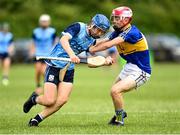 24 June 2023; Gus Lohan of Oranmore Maree in action against Sam O'Donovan of Carrigtwohill during the John West Féile na nGael at Connacht GAA Centre of Excellence in Bekan, Mayo. Photo by Stephen Marken/Sportsfile