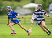 24 June 2023; Lily Fahy of Newmarket on Fergus in action against Leah Barrett of Turloughmore during the John West Féile na nGael at Connacht GAA Centre of Excellence in Bekan, Mayo. Photo by Stephen Marken/Sportsfile