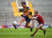 24 June 2023; Enda Smith of Roscommon is tackled by Matty Taylor of Cork during the GAA Football All-Ireland Senior Championship Preliminary Quarter Final match between Cork and Roscommon at Páirc Uí Chaoimh in Cork. Photo by Tom Beary/Sportsfile