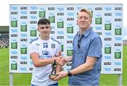 24 June 2023; Seán Óg McElwain of Monaghan is presented with the Electric Ireland Player of the Match award by Electric Ireland Customer Relationship Manager Bill Boucher following his performance in the Electric Ireland GAA All-Ireland Minor Football Championship Semi-Final match between Kerry and Monaghan at Glenisk O'Connor Park in Tullamore, Offaly. Photo by Seb Daly/Sportsfile