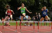 24 June 2023; From right, Caoimhe Byrne O'Connell, 204, from Mary I Lisdoonvarna, Munster, lumps the last hurdle to win the Girls 300m Hurdles with second place Molly Daly, 111, from Loreto Kilkenny, Leinster, and third place Orlaith Mannion, from Seamount College Kinvara, Connacht, during the 123.ie Tailteann School’s Interprovincial Games at the SETU Campus in Carlow. Photo by Matt Browne/Sportsfile