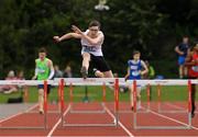24 June 2023; Ethan Dewhirst, from St Columba Glenties, Ulster, jumps the last hurdle before winning the Boys 400m during the 123.ie Tailteann School’s Interprovincial Games at the SETU Campus in Carlow. Photo by Matt Browne/Sportsfile