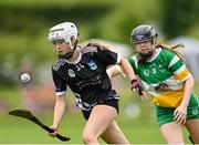 24 June 2023; Hazel Horgan of Newcastle West in action against Roisin Dwyer of Duffry Rovers during the John West Féile na nGael at Connacht GAA Centre of Excellence in Bekan, Mayo. Photo by Stephen Marken/Sportsfile