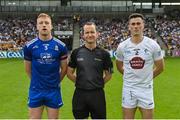 24 June 2023; Referee Jerome Henry with team captains Kieran Duffy of Monaghan and Mick O’Grady of Kildare before the GAA Football All-Ireland Senior Championship Preliminary Quarter Final match between Kildare and Monaghan at Glenisk O'Connor Park in Tullamore, Offaly. Photo by Seb Daly/Sportsfile