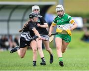 24 June 2023; Leah Roban of Duffry Rovers in action against Sarah Doyle of Newcastle West during the John West Féile na nGael at Connacht GAA Centre of Excellence in Bekan, Mayo. Photo by Stephen Marken/Sportsfile