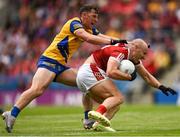 24 June 2023; Brian O’Driscoll of Cork is tackled by Diarmuid Murtagh of Roscommon during the GAA Football All-Ireland Senior Championship Preliminary Quarter Final match between Cork and Roscommon at Páirc Uí Chaoimh in Cork. Photo by Tom Beary/Sportsfile