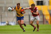 24 June 2023; Enda Smith of Roscommon is tackled by Ian Maguire of Cork during the GAA Football All-Ireland Senior Championship Preliminary Quarter Final match between Cork and Roscommon at Páirc Uí Chaoimh in Cork. Photo by Tom Beary/Sportsfile