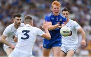 24 June 2023; Ryan O’Toole of Monaghan in action against Shea Ryan of Kildare, 3, during the GAA Football All-Ireland Senior Championship Preliminary Quarter Final match between Kildare and Monaghan at Glenisk O'Connor Park in Tullamore, Offaly. Photo by Seb Daly/Sportsfile
