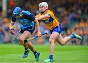 24 June 2023; Paul Crummey of Dublin is tackled by Adam Hogan of Clare during the GAA Hurling All-Ireland Paul Crummey of Dublin Championship Quarter Final match between Clare and Dublin at TUS Gaelic Grounds in Limerick. Photo by Ray McManus/Sportsfile