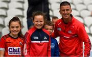 24 June 2023; Cork performance coach Rob Heffernan with Cork supporters, from left, Emma O’Connor, aged 10, Emily O’Neill, aged 11 and Cian O’Connor, age 8 before the GAA Football All-Ireland Senior Championship Preliminary Quarter Final match between Cork and Roscommon at Páirc Uí Chaoimh in Cork. Photo by Tom Beary/Sportsfile