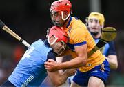 24 June 2023; Paddy Smyth of Dublin is tackled by Peter Duggan of Clare during the GAA Hurling All-Ireland Senior Championship Quarter Final match between Clare and Dublin at TUS Gaelic Grounds in Limerick. Photo by Piaras Ó Mídheach/Sportsfile