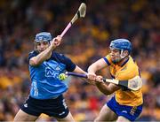 24 June 2023; Shane O'Donnell of Clare shoots to score his side's fourth goal, under pressure from Eoghan O'Donnell of Dublin during the GAA Hurling All-Ireland Senior Championship Quarter Final match between Clare and Dublin at TUS Gaelic Grounds in Limerick. Photo by Piaras Ó Mídheach/Sportsfile