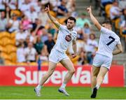 24 June 2023; Kevin Flynn of Kildare, left, celebrates alongside teammate Jack Sargent, 7, after kicking a point during the GAA Football All-Ireland Senior Championship Preliminary Quarter Final match between Kildare and Monaghan at Glenisk O'Connor Park in Tullamore, Offaly. Photo by Seb Daly/Sportsfile