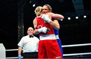 24 June 2023; Amy Broadhurst of Ireland, left, is embraced by Milena Matovic of Serbia after her victory in their Welterweight 66kg bout at the Nowy Targ Arena during the European Games 2023 in Poland. Photo by Tyler Miller/Sportsfile