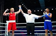 24 June 2023; Amy Broadhurst of Ireland, left, celebrates after her victory against Milena Matovic of Serbia in their Welterweight 66kg bout at the Nowy Targ Arena during the European Games 2023 in Poland. Photo by Tyler Miller/Sportsfile