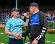 24 June 2023; The two managers, Dublin manager Micheál Donoghue and Clare hurling manager Brian Lohan, shake hands after the GAA Hurling All-Ireland Senior Championship Quarter Final match between Clare and Dublin at TUS Gaelic Grounds in Limerick. Photo by Ray McManus/Sportsfile