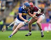 24 June 2023; Alan Tynan of Tipperary in action against Ronan Glennon of Galway during the GAA Hurling All-Ireland Senior Championship Quarter Final match between Galway and Tipperary at TUS Gaelic Grounds in Limerick. Photo by Piaras Ó Mídheach/Sportsfile