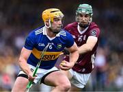 24 June 2023; Ronan Maher of Tipperary in action against Evan Niland of Galway during the GAA Hurling All-Ireland Senior Championship Quarter Final match between Galway and Tipperary at TUS Gaelic Grounds in Limerick. Photo by Piaras Ó Mídheach/Sportsfile