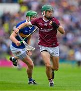 24 June 2023; Evan Niland of Galway is tackled by Noel McGrath of Tipperary during the GAA Hurling All-Ireland Senior Championship Quarter Final match between Galway and Tipperary at TUS Gaelic Grounds in Limerick. Photo by Ray McManus/Sportsfile
