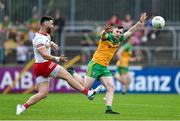 24 June 2023; Pádraig Hampsey of Tyrone in action against Jamie Brennan of Donegal during the GAA Football All-Ireland Senior Championship Preliminary Quarter Final match between Donegal and Tyrone at MacCumhaill Park in Ballybofey, Donegal. Photo by Brendan Moran/Sportsfile