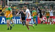 24 June 2023; Ruairi Canavan of Tyrone, second from left, celebrates after scoring his side's first goal during the GAA Football All-Ireland Senior Championship Preliminary Quarter Final match between Donegal and Tyrone at MacCumhaill Park in Ballybofey, Donegal. Photo by Brendan Moran/Sportsfile